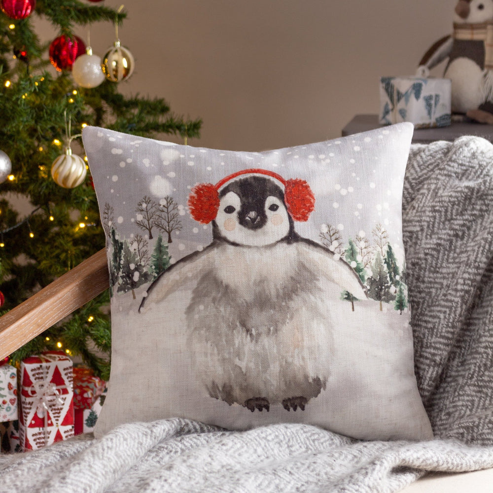 Snowy Penguin with Earmuffs 43x43 Feather Filled Cushion - Canwell Interiors Limited - Riva